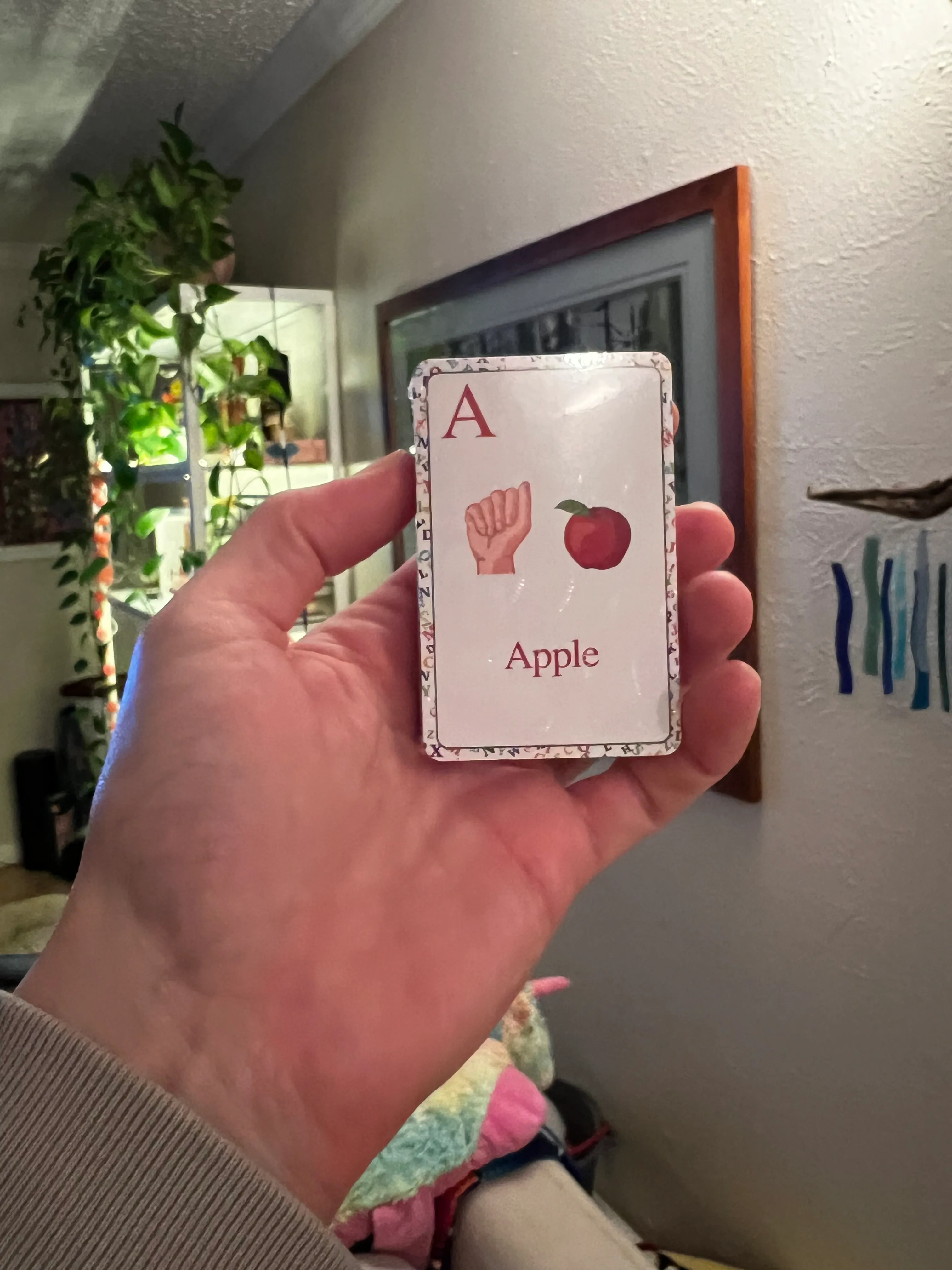 ASL Deck with A is for Apple with the finger sign for A showing